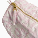 Pink and white cosmetic pouch