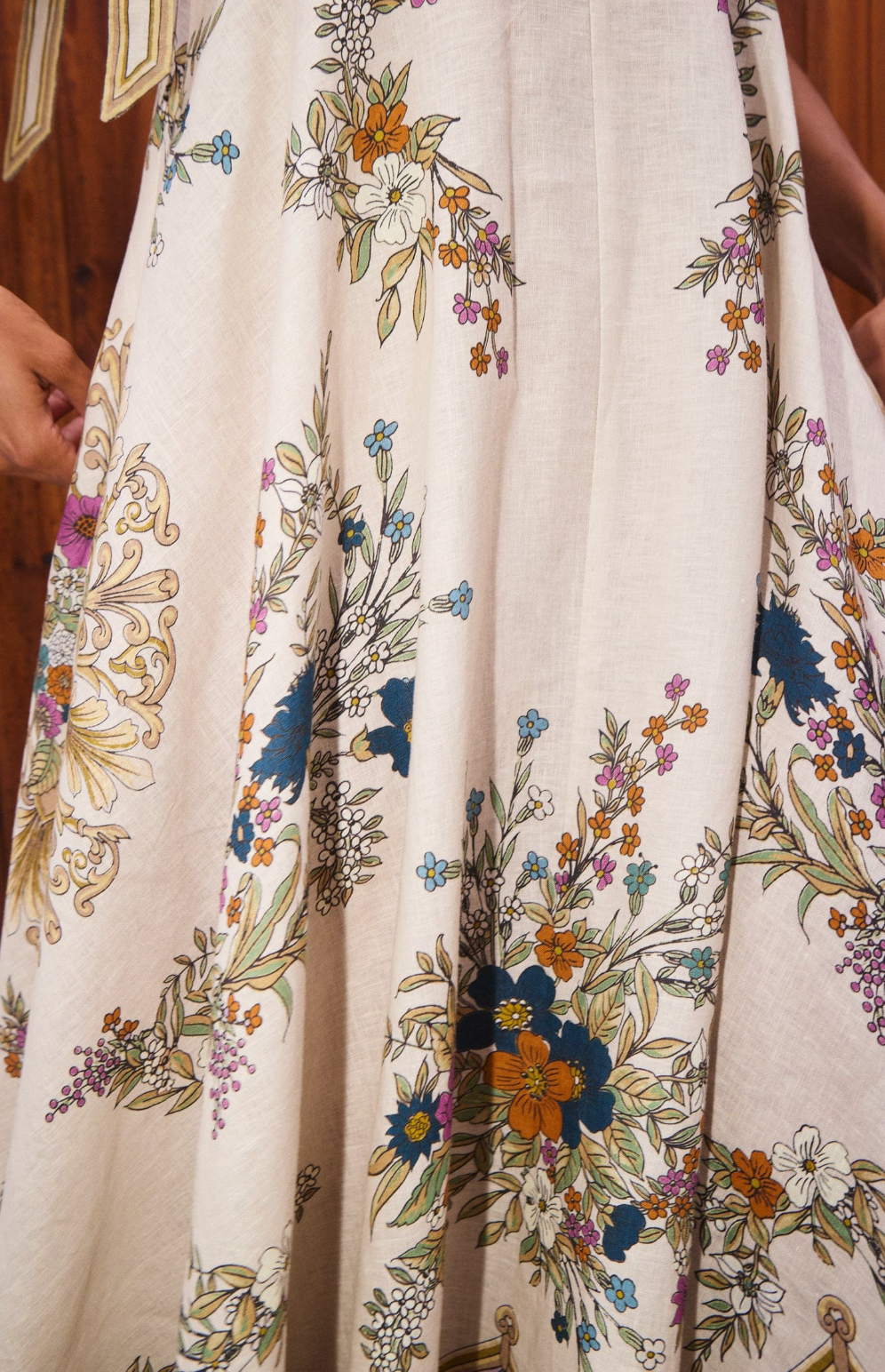 Close-up of a floral-patterned fabric with a neutral background