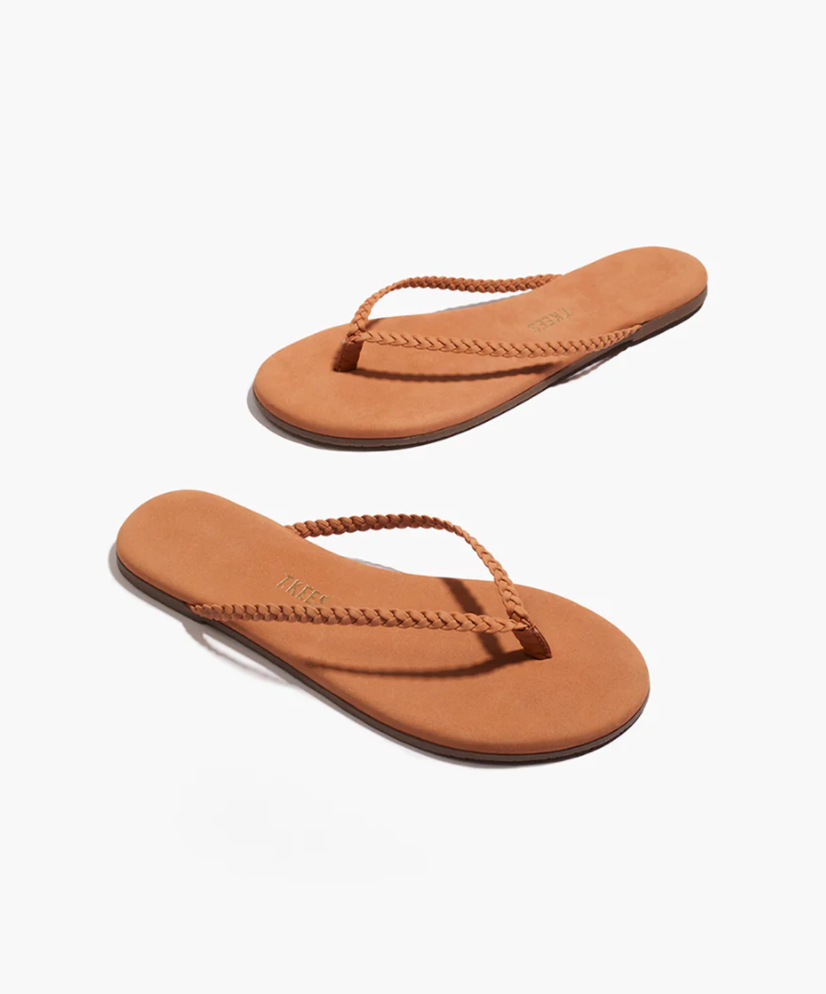 Pair of brown sandals on a white background