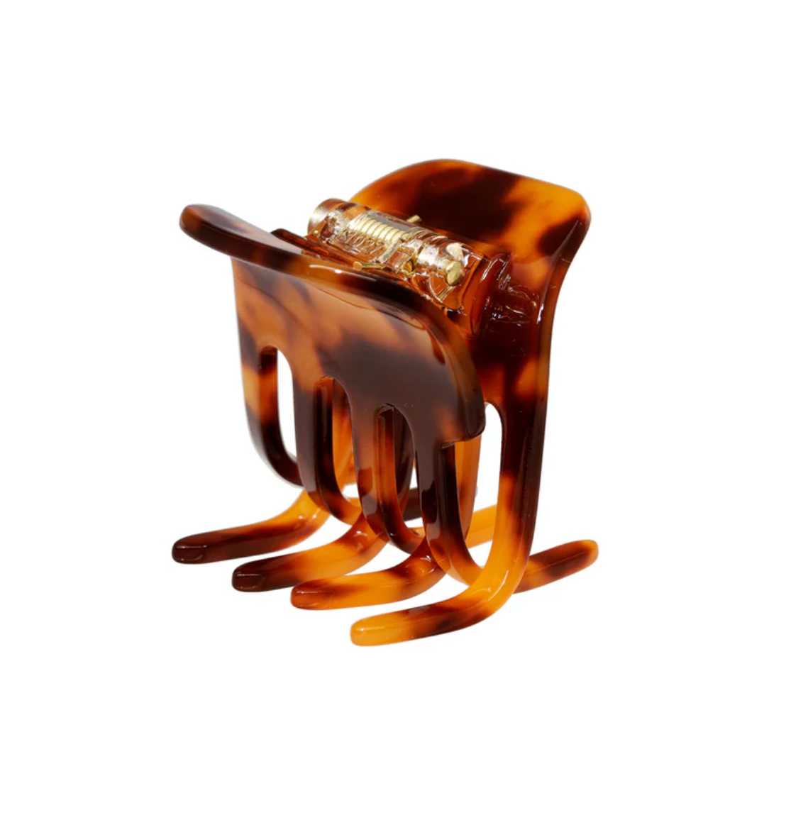 Tortoiseshell hair clip on a white background