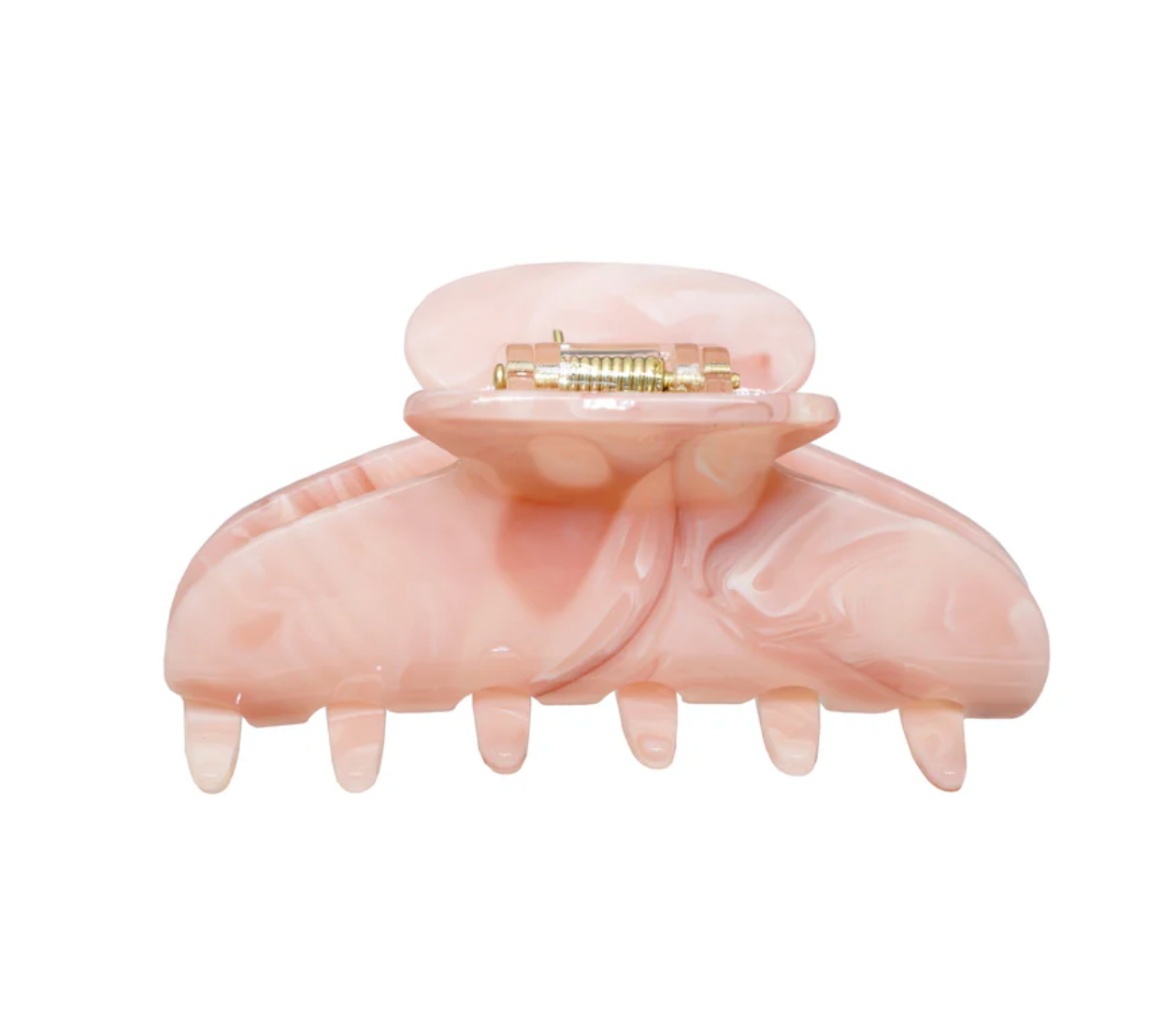 Pink hair clip with gold interior on a white background