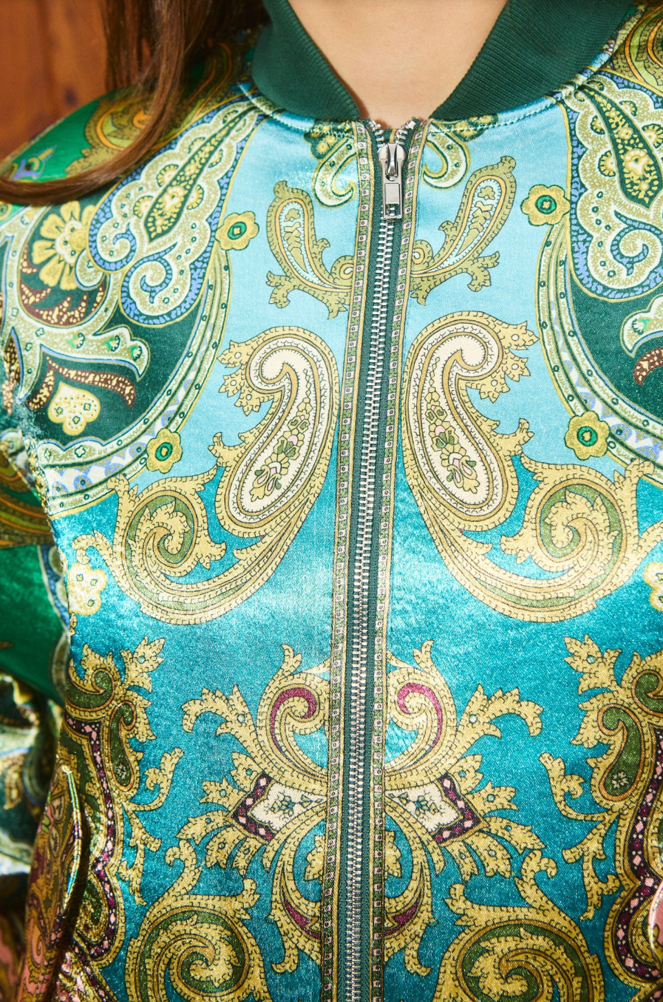 detail of green bomber jacket