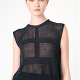 Black sleeveless knit top worn by a model on a white background
