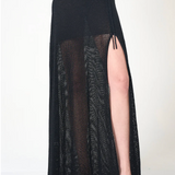 Black mesh skirt with a high slit on a white background
