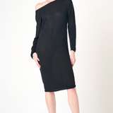 Woman wearing a black one-shoulder dress on a white background
