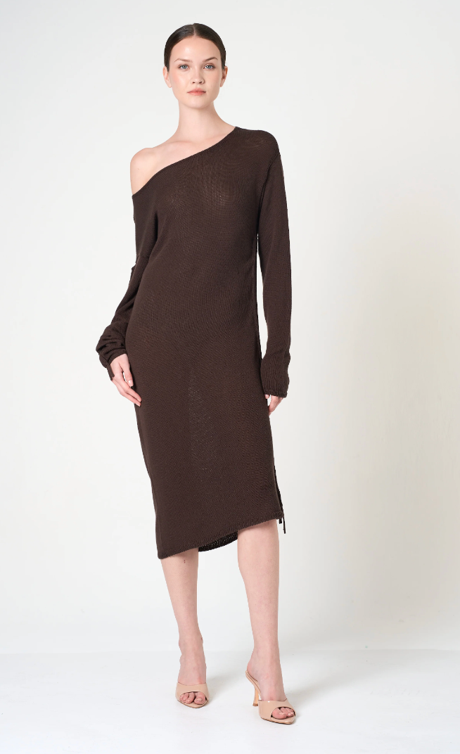 Woman wearing a brown one-shoulder dress on a white background