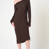 Woman wearing a brown one-shoulder dress on a white background