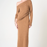 Woman wearing a brown off-shoulder dress on a white background