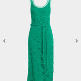 Green lace dress on a light gray background