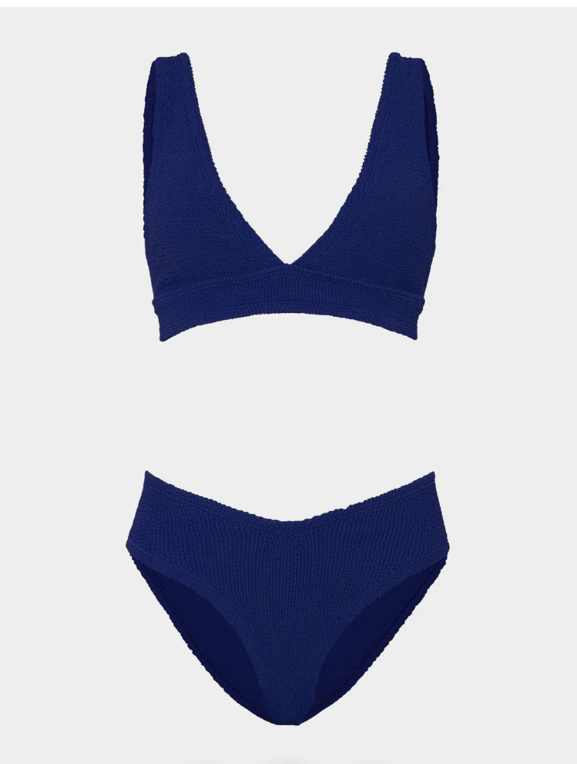 Navy blue bikini set on a white background