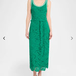 Green lace dress on a white background