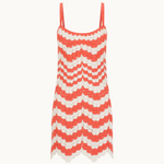 Red and white zigzag patterned dress on a white background