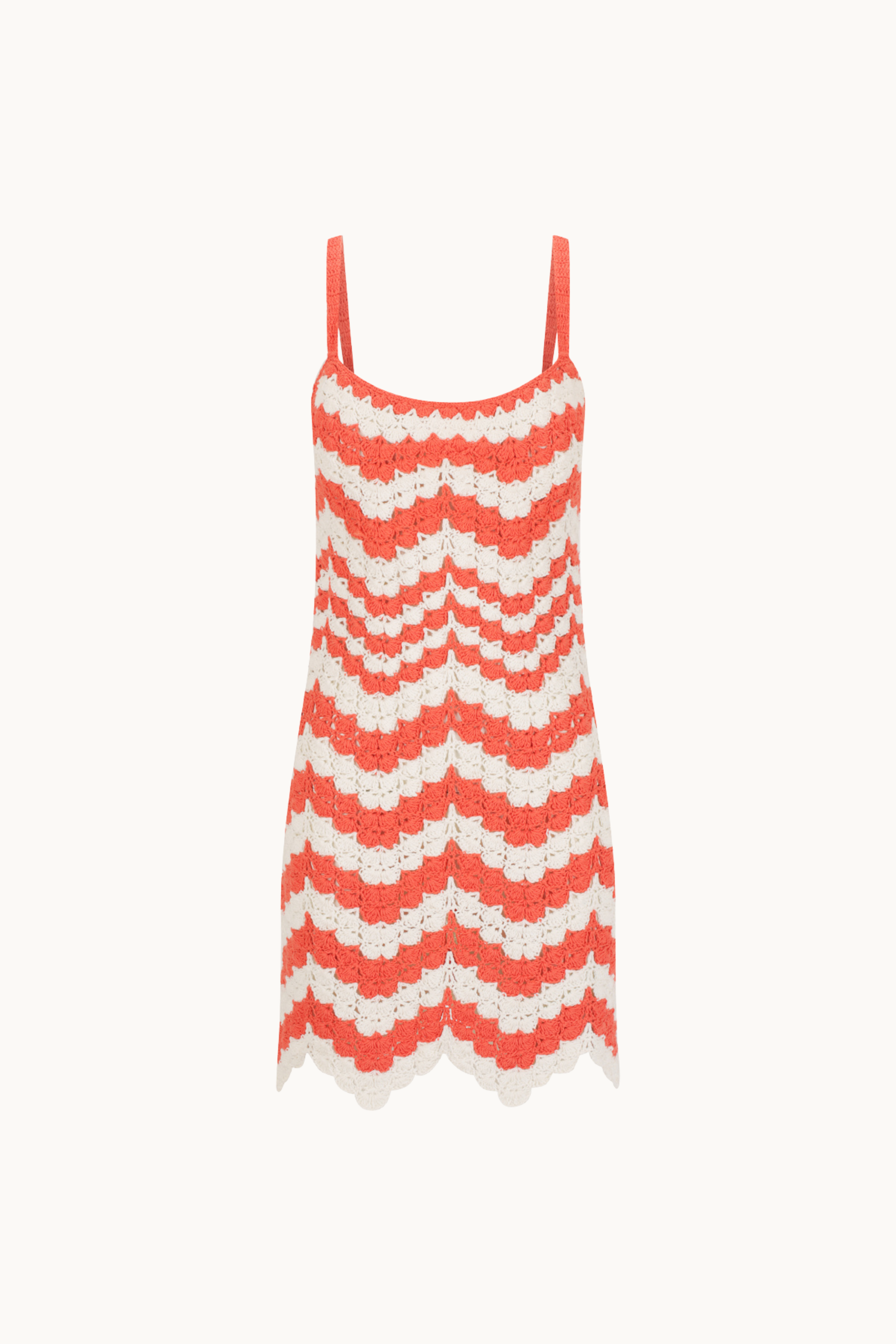 Red and white zigzag patterned dress on a white background