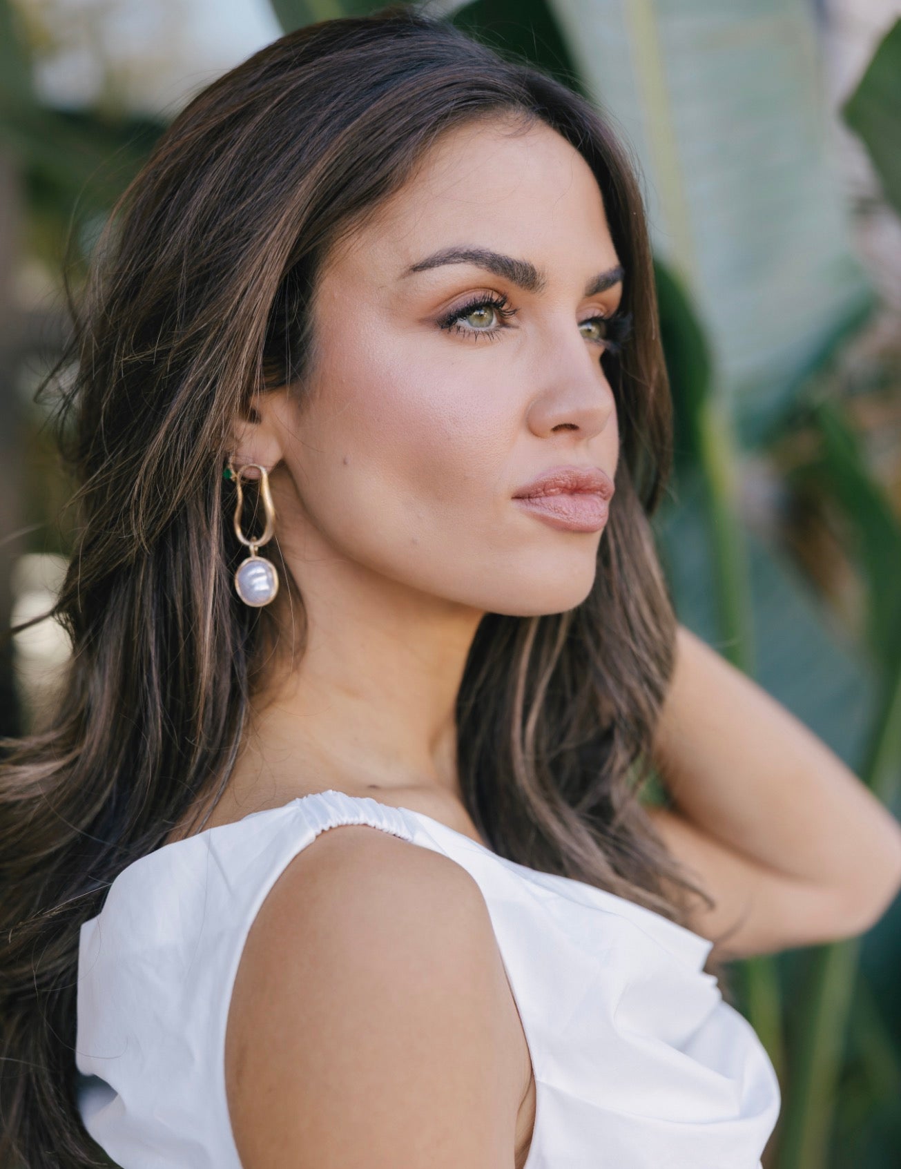 Brushed brass earring with faux pearl detail 