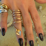 Calla lily wavy ring in gold brass finish

