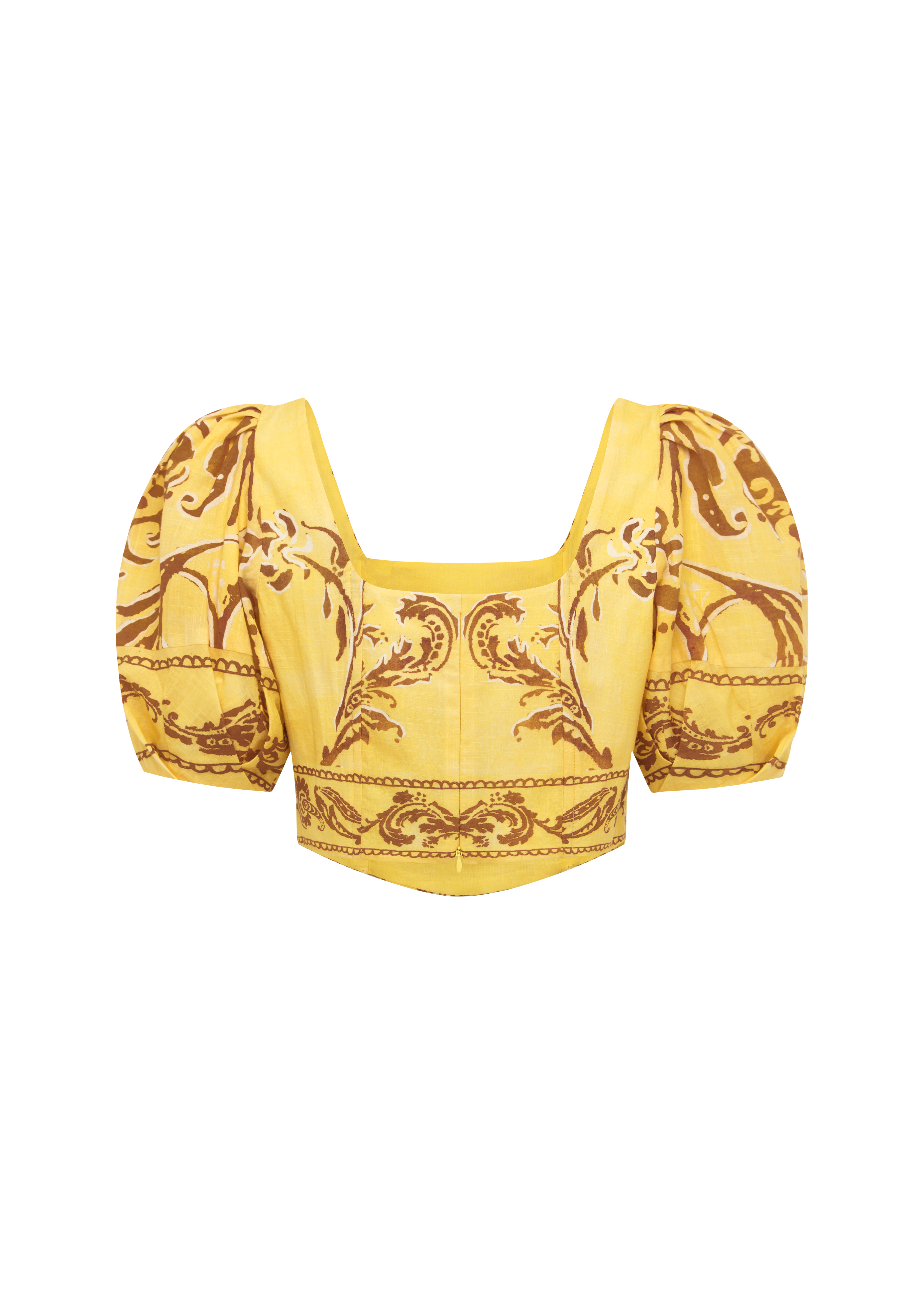 Yellow top with intricate pattern on a white background