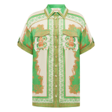 Green patterned shirt on a white background