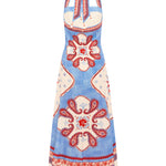 Blue dress with red and white floral patterns on a white background
