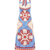 Blue dress with red and white floral patterns on a white background