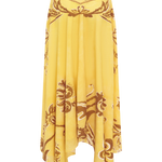 Yellow skirt with intricate brown patterns on a white background
