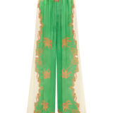 Green and orange patterned pants on a white background