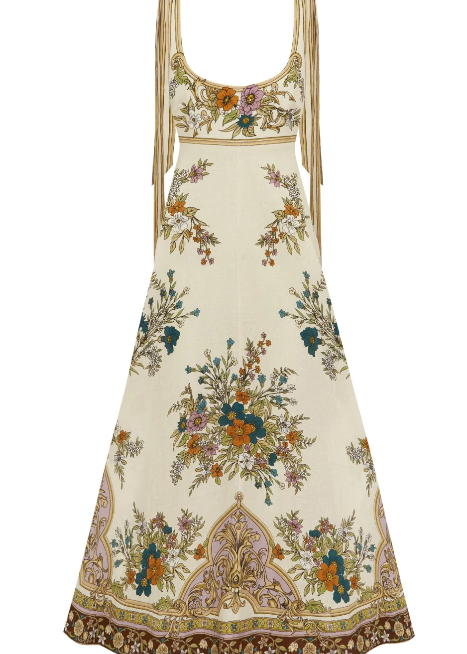 Floral patterned dress with intricate designs on a white background