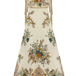 Floral patterned dress with intricate designs on a white background