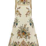 Floral patterned dress with intricate designs on a white background