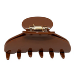 Brown hair clip on a white background