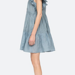 Light blue dress with ruffled details on a white background
