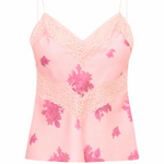 Pink floral lace camisole on a white background