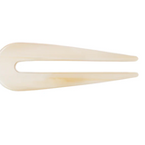 Beige hair clip on a white background