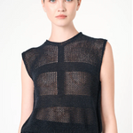 Black sleeveless knit top worn by a model on a white background