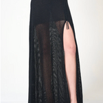 Black mesh skirt with a high slit on a white background