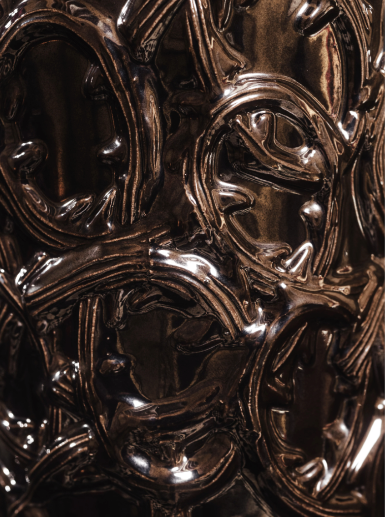 Close-up of ornate, metallic design with intricate patterns