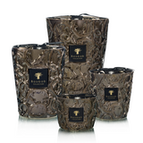 Set of decorative candles with intricate designs and 'Baobab' branding on a white background