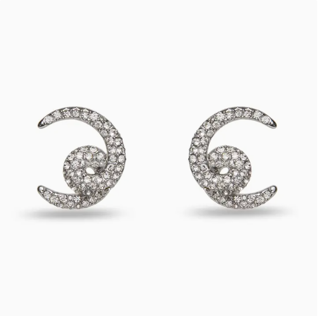 Pair of silver crescent moon earrings with embedded stones on a white background