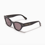 Black cat eye sunglasses with gold detailing on a white background