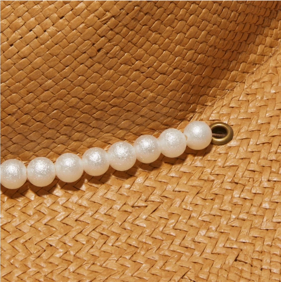 Pearl band on a woven straw background