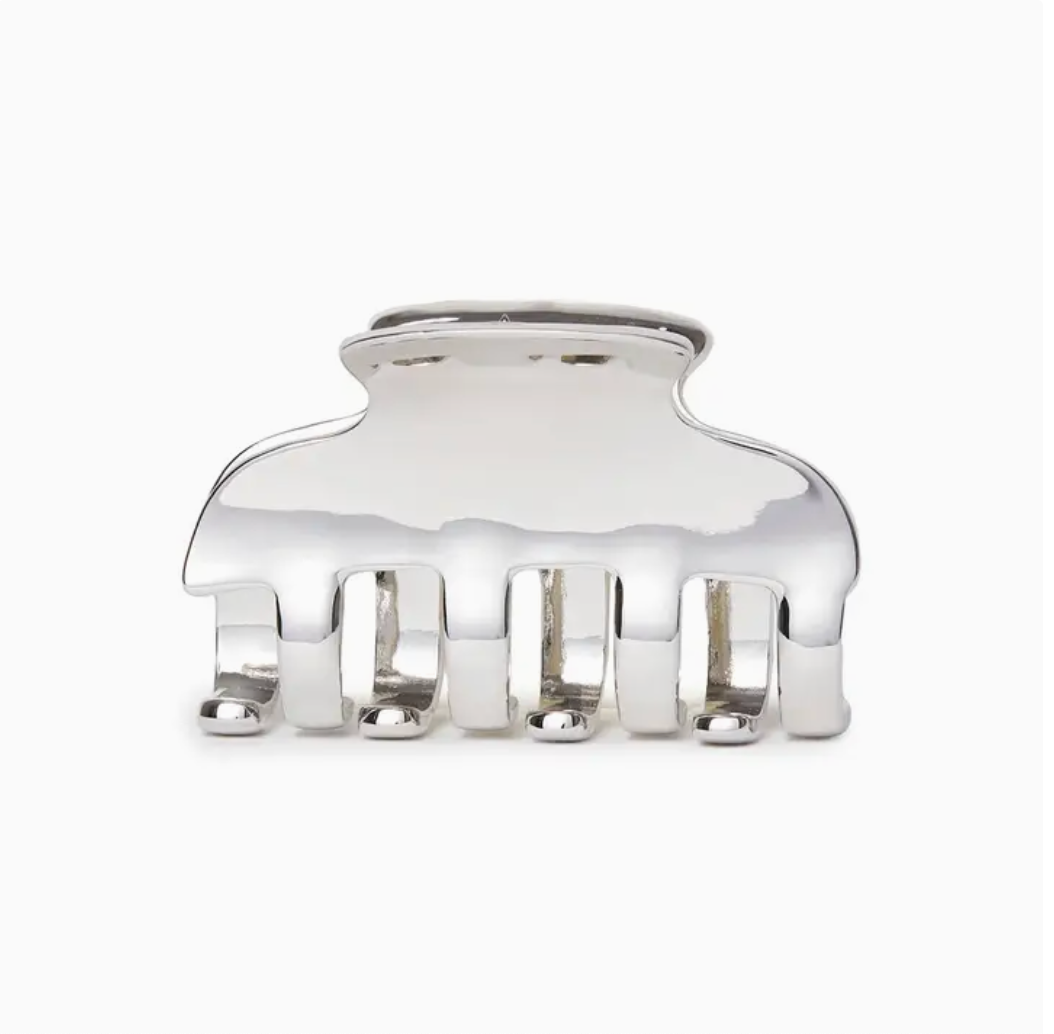 Silver hair clip on a white background