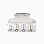 Silver hair clip on a white background