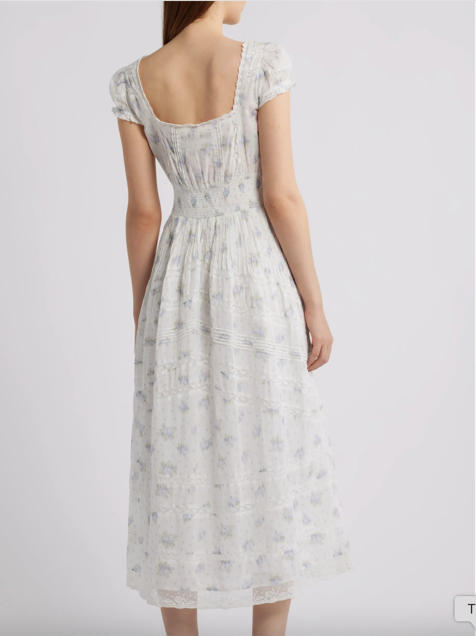 White lace and floral maxi dress on a white background