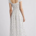 White lace and floral maxi dress on a white background