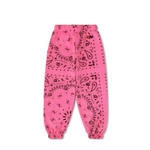 Pink sweatpants with black bandana pattern on a white background