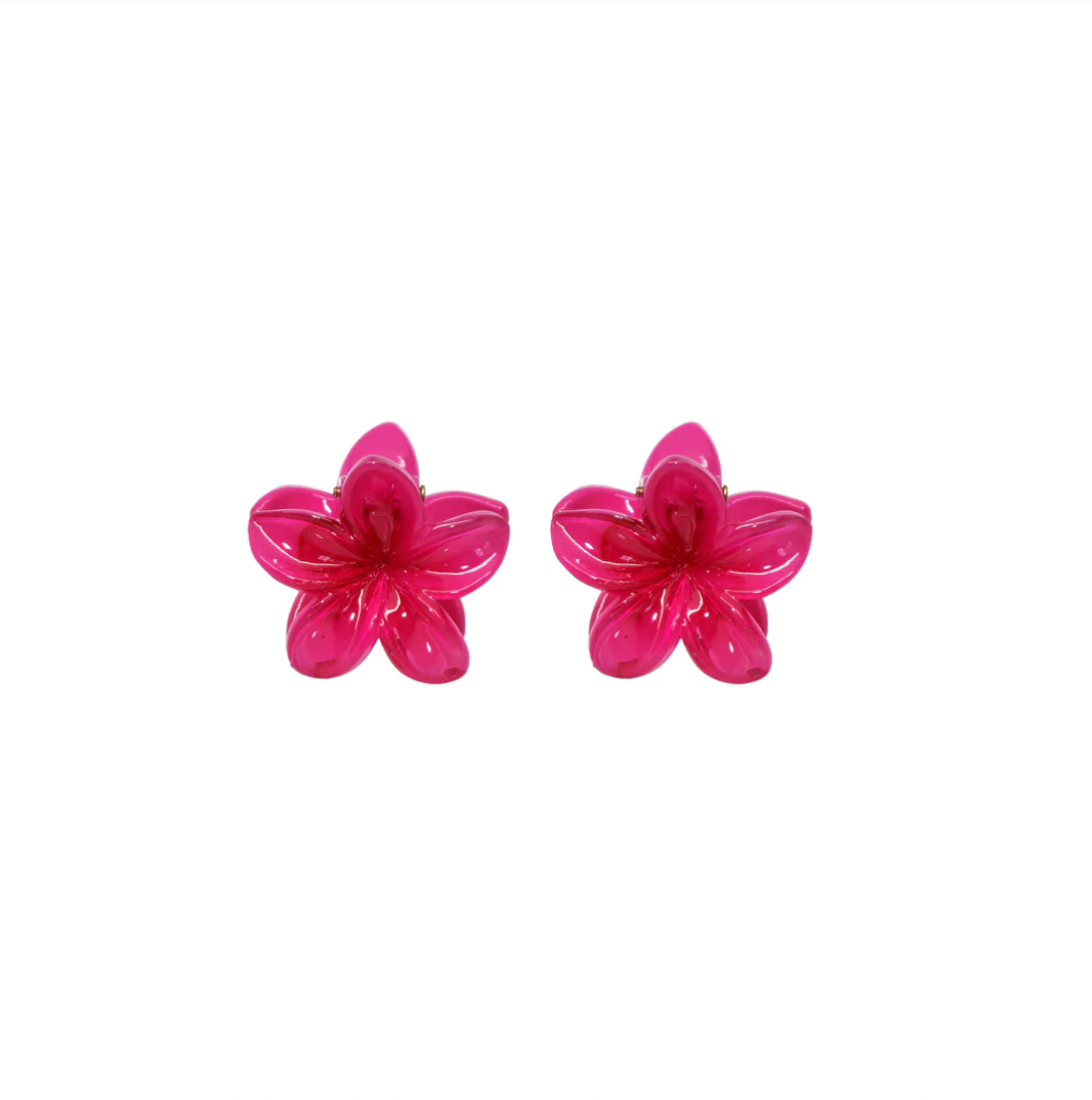 Pair of bright pink flower shaped hair clips
