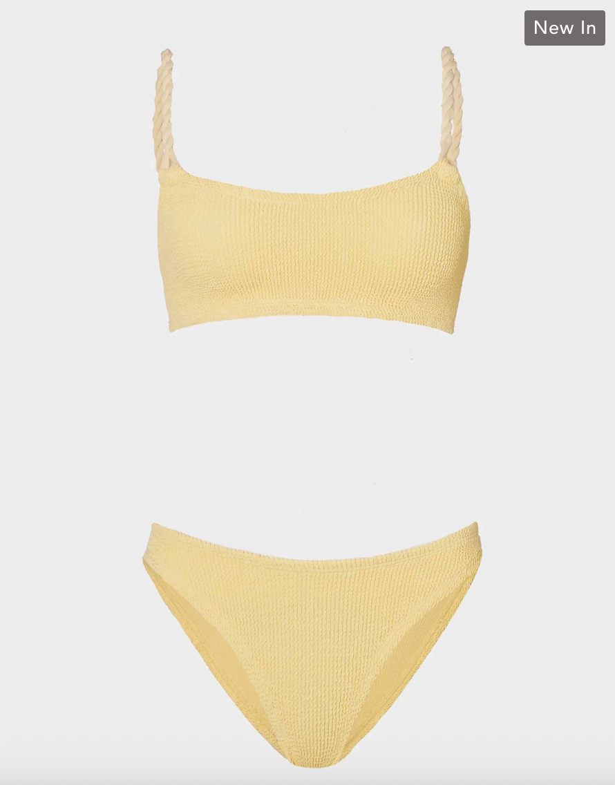 Yellow bikini set on a white background