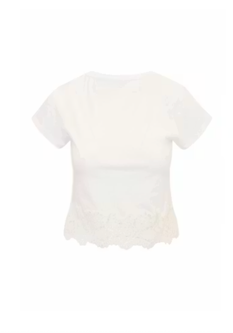 White lace-trimmed top on a white background