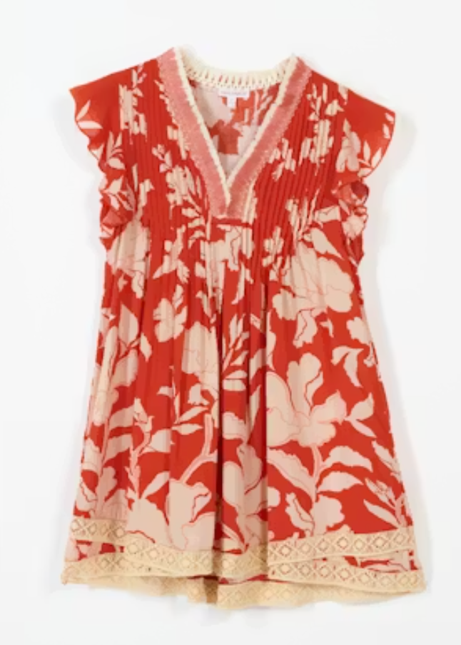 Red floral dress with white flowers on a white background