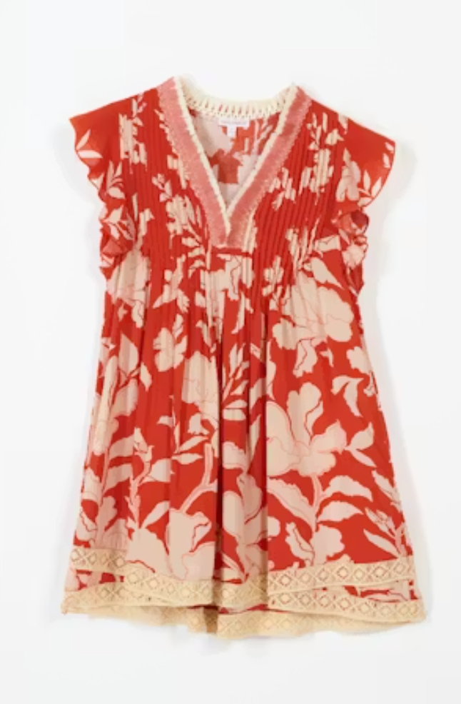 Red floral dress with white flowers on a white background