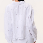 White embroidered top and shorts set on a white background